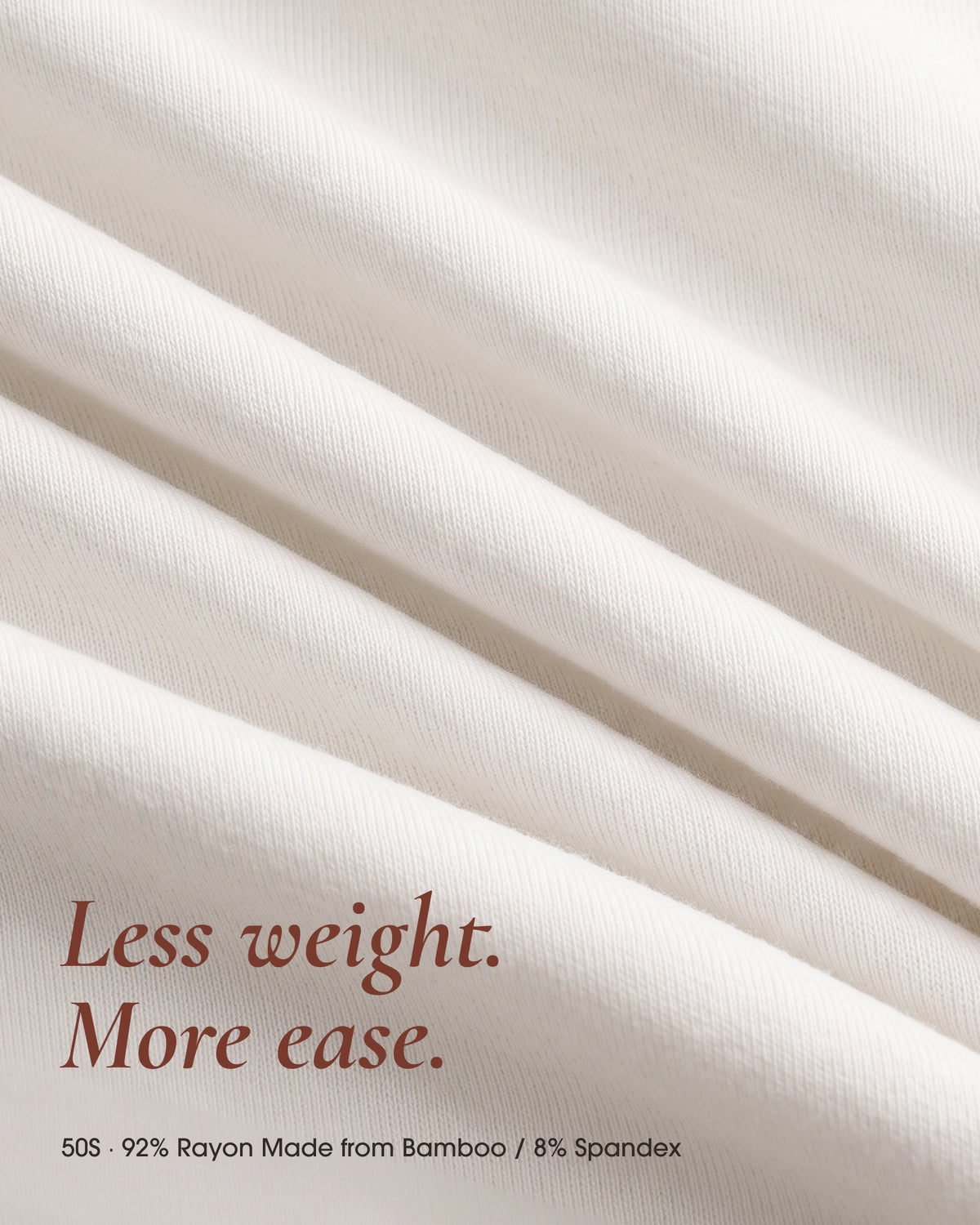 Close-up of white knit fabric for underherwear trunks, labeled 50S, 92% rayon made from bamboo and 8% spandex.